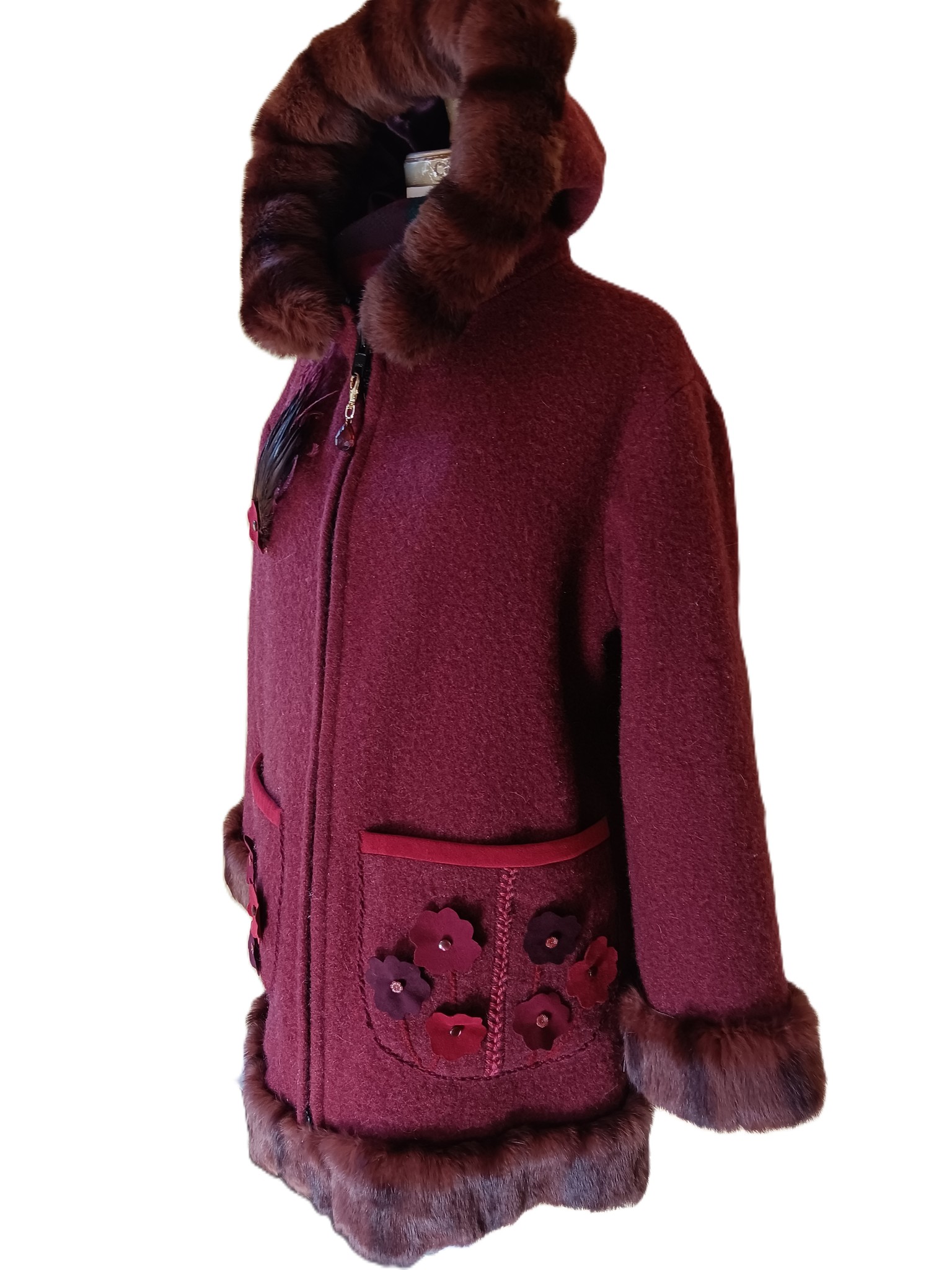 Red coat with red fur trim with flowers embroidered on pockets