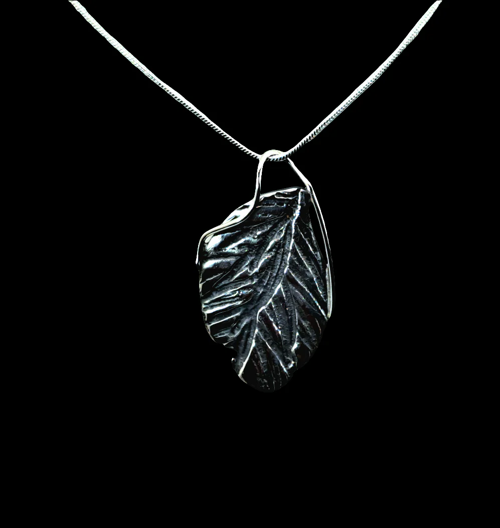 Sterling silver leaf pendant by brand Solace Designs