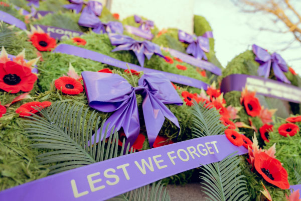 wreaths saying Lest We Forget